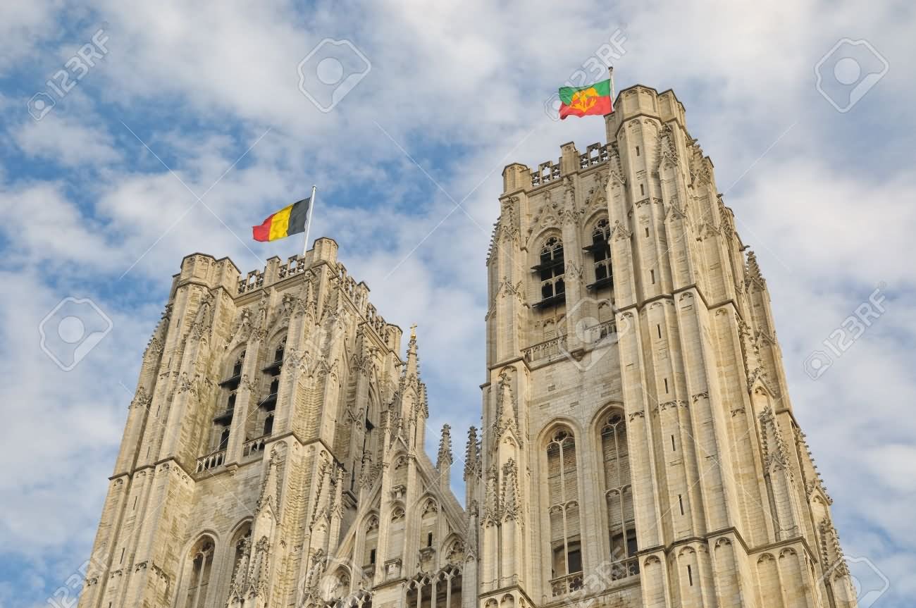 Flags Of Belgium On The Top Of The Cathedral of St. Michael and St. Gudula