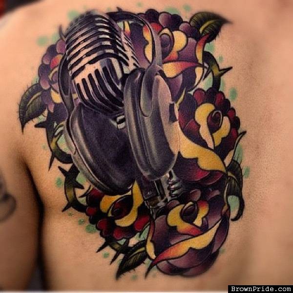 Flowers And Microphone Tattoo On Left Back Shoulder