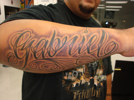 Gabriel Name Tattoo On Man Right Forearm