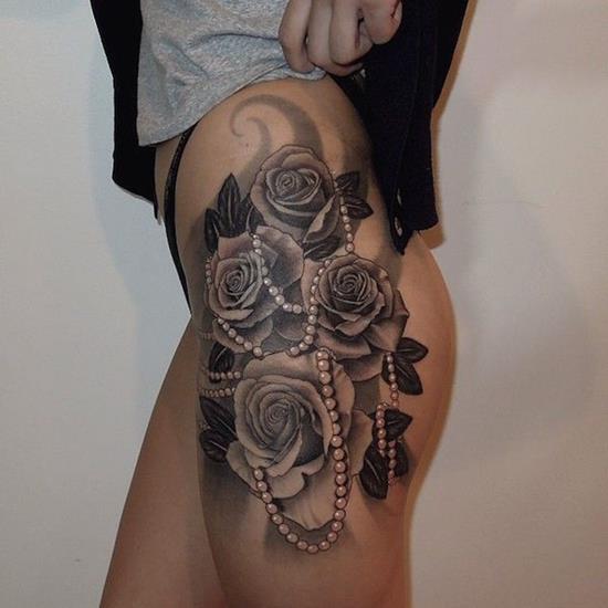 Grey Flowers And Pearl Chain Tattoo On Side Thigh
