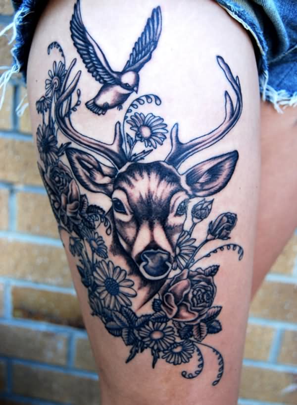 Grey Ink Flying Bird And Deer Head Tattoo On Thigh