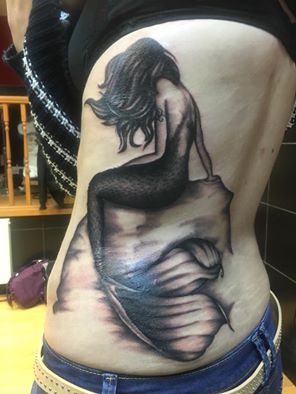 Grey Ink Mermaid Tattoo On Side Rib by Tony
