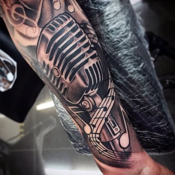 Grey Ink Microphone Tattoo On Arm