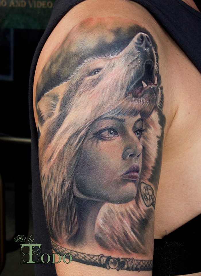 Grey Ink Wolf Girl Tattoo On Half Sleeve by Todo