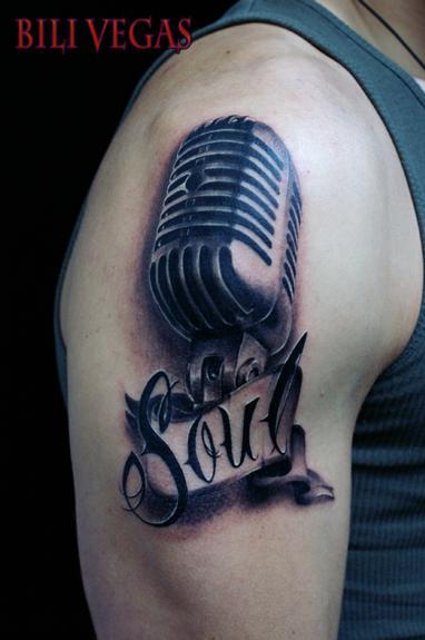 Grey Microphone Tattoo On Right Shoulder