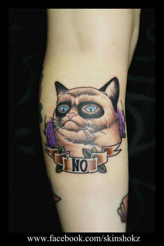 Grumpy Cat Tattoo On Arm by Paul Priestley