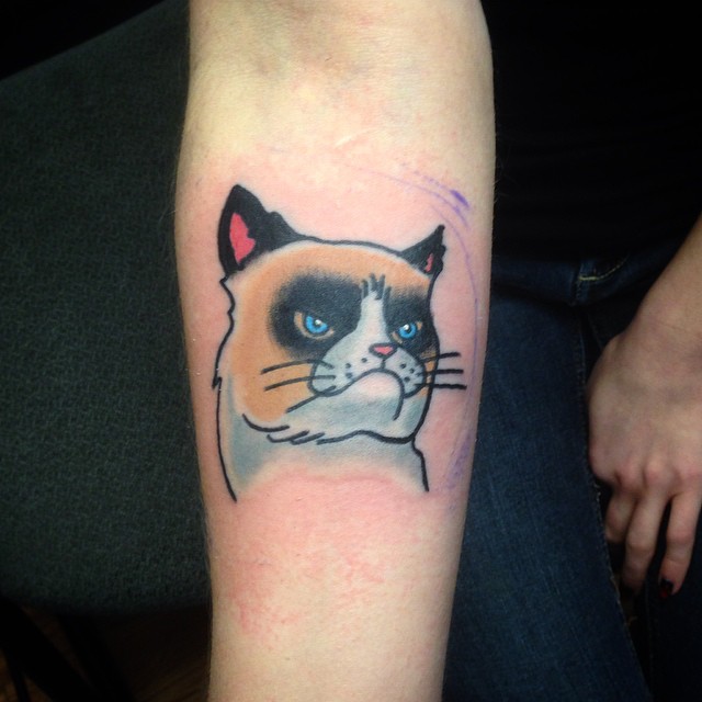Grumpy Cat Tattoo On Right Forearm