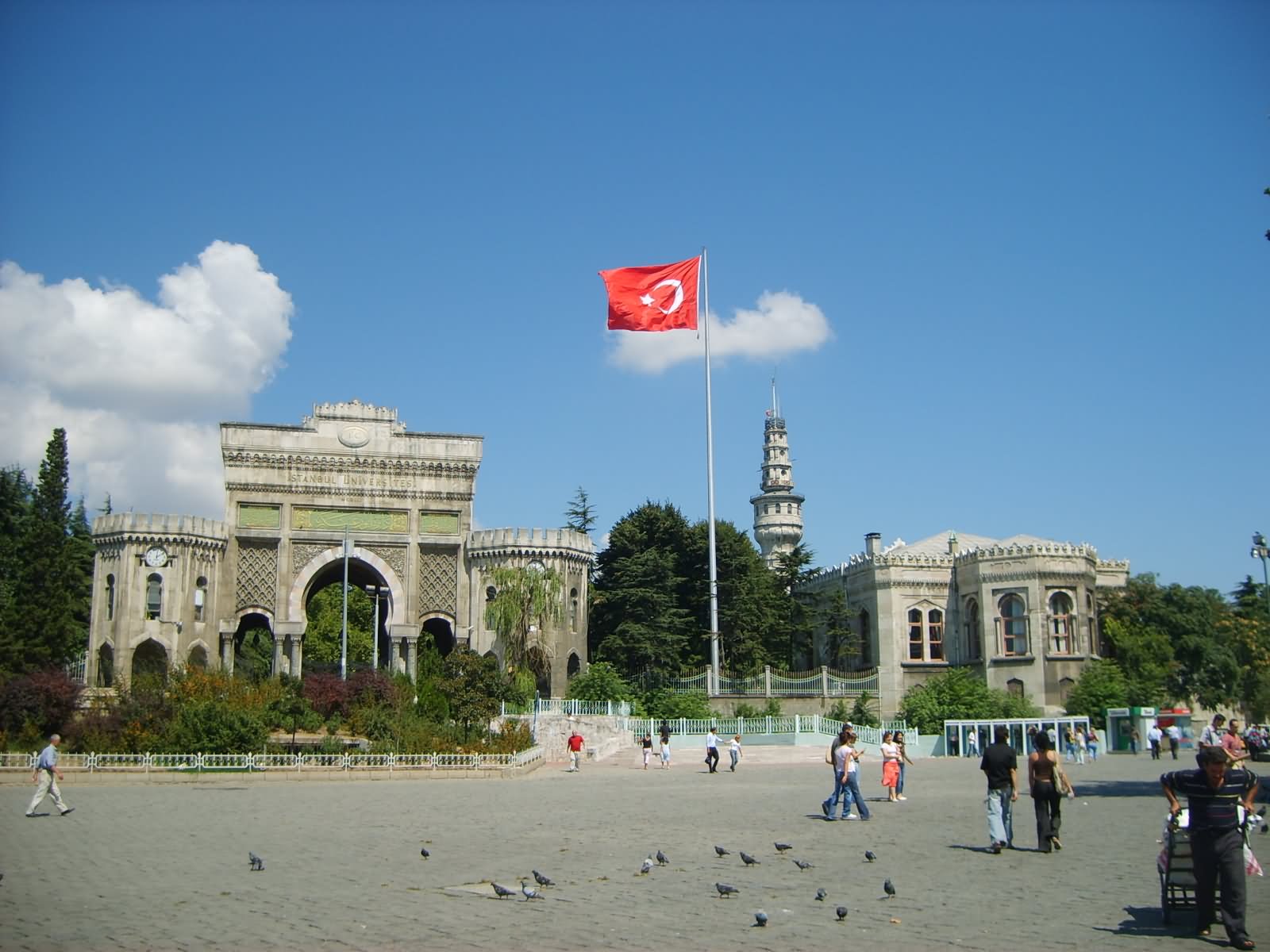 Istanbul University And Waving Turkey Flag At The Beyazit Square