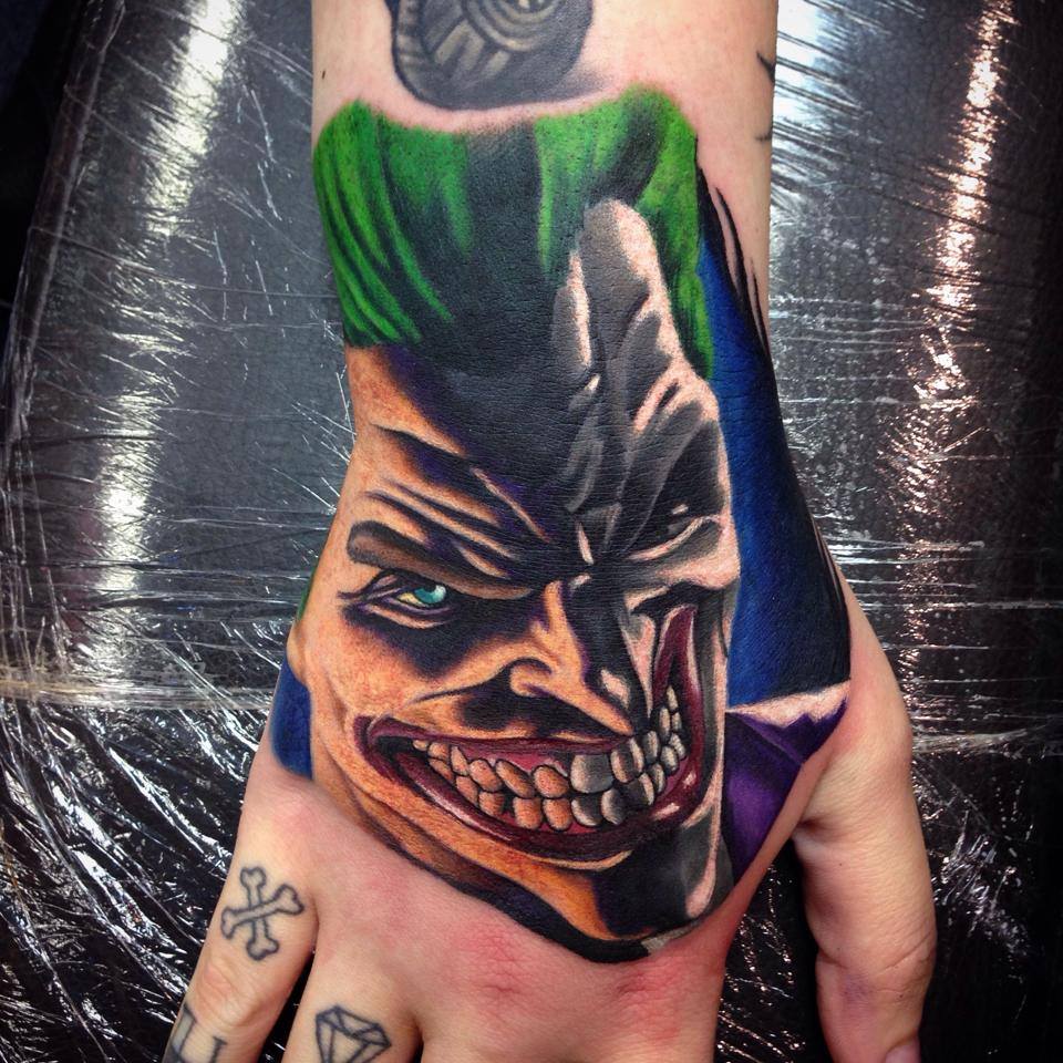 Joker Head Tattoo On Hand by Paul Priestley