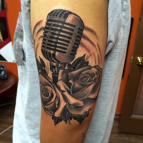 Left Bicep Grey Rose Microphone Tattoo On Left Bicep