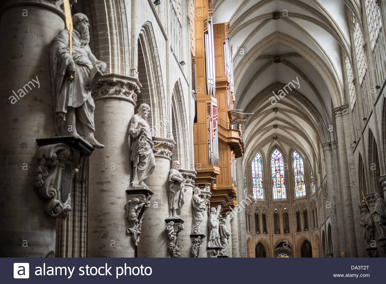 Main Hall Of The St. Michael And St. Gudula Cathedral With Statues On The Columns