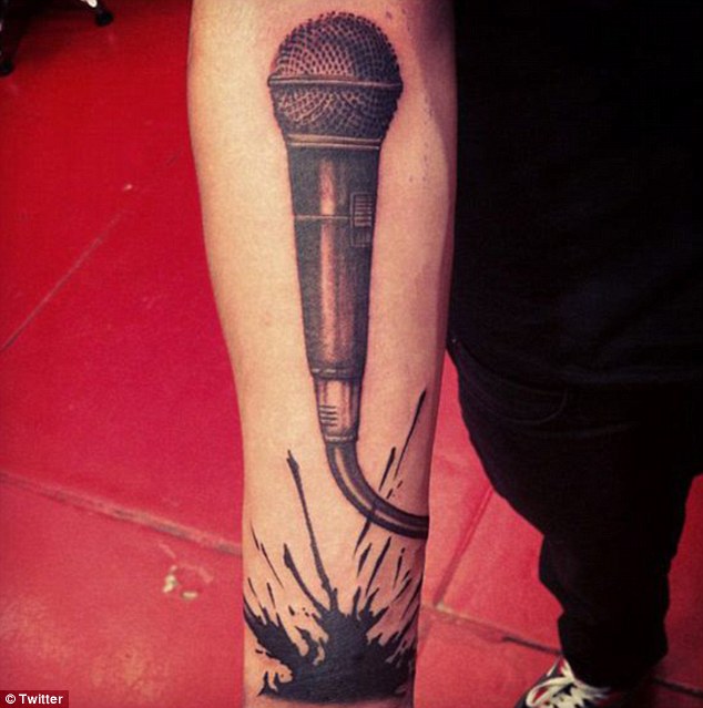 Microphone Tattoo On Right Forearm