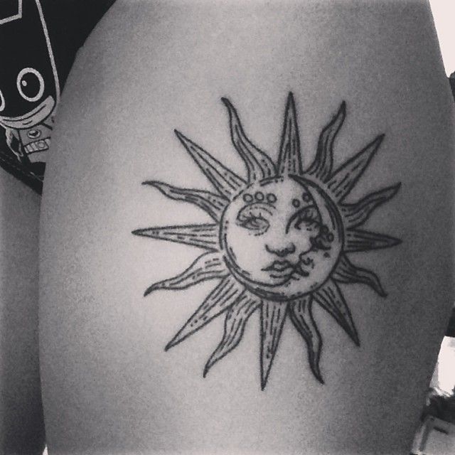 Moon And Sun Tattoo On Left Thigh