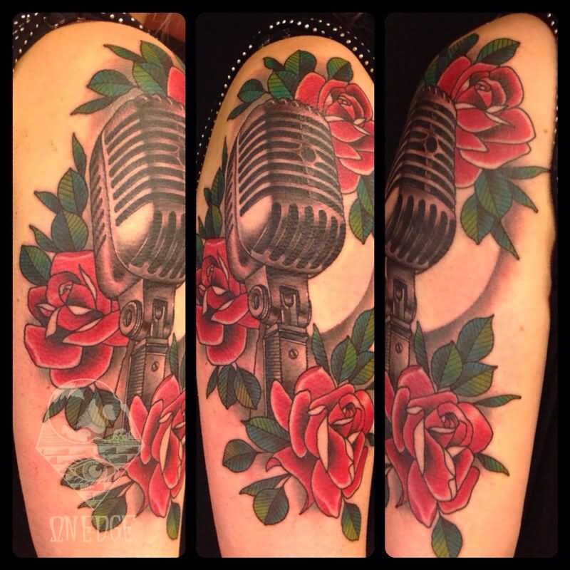 Nice Red Rose And Microphone Tattoo On Half Sleeve