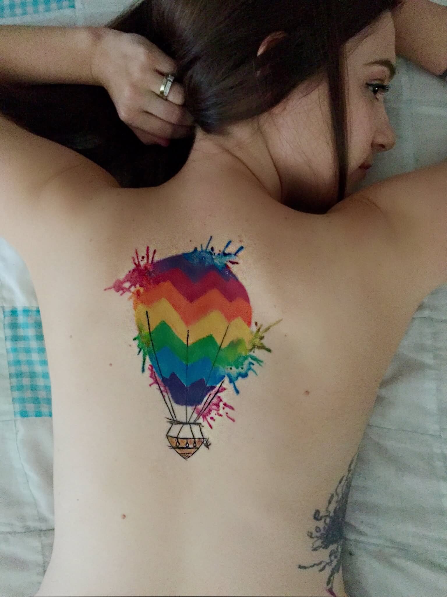 Nice Watercolor Hot Balloon Tattoo On Upper Back