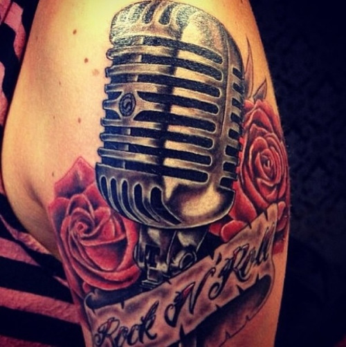 Pink Roses And Microphone Tattoo On Shoulder