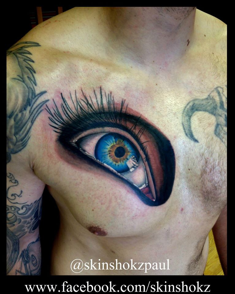 Realistic Eye Tattoo On Man Chest by Paul Priestley
