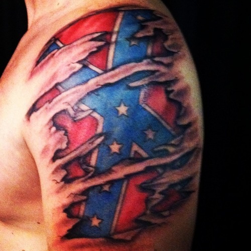 Ripped Skin Rebel Flag Tattoo On Man Left Shoulder