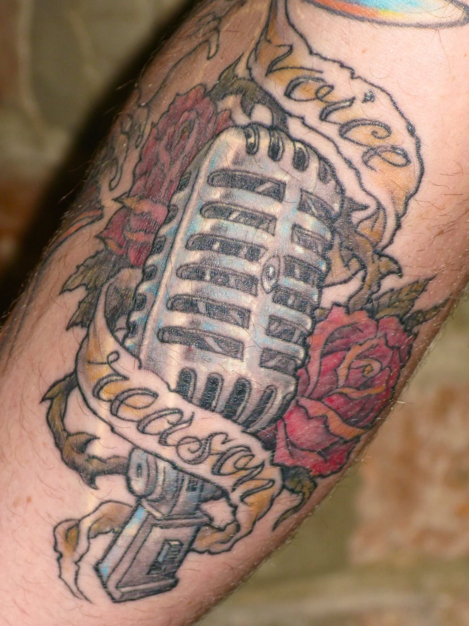 Rose Flower And Microphone Tattoo