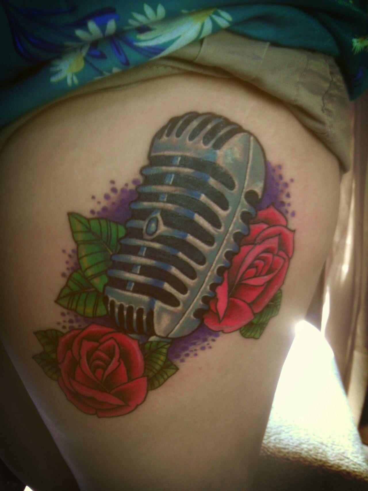 Rose Flowers And Microphone Tattoo On Side Thigh