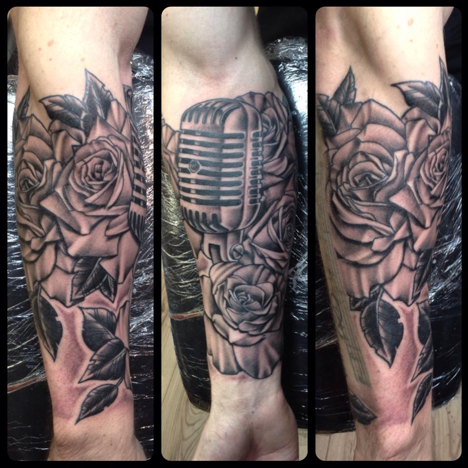 Roses And Microphone Tattoo On Forearm by Paul Priestley