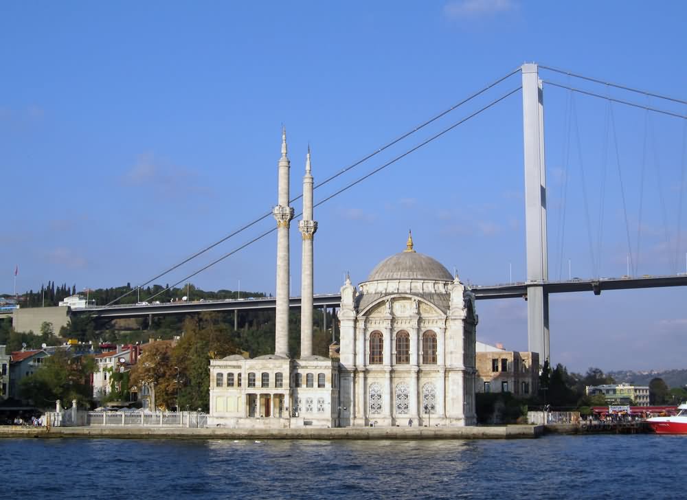 Side View Of The Ortakoy Mosque And Bosphorus Bridge In Istanbul