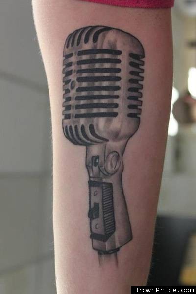 Simple Grey Microphone Tattoo