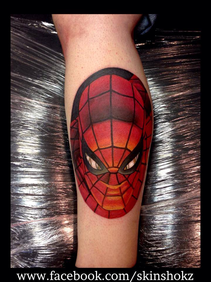 Spiderman Head Tattoo On Leg by Paul Priestley