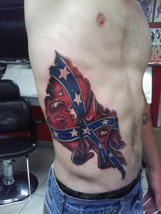 Torn Rebel Flag Tattoo On Man Right Side Rib