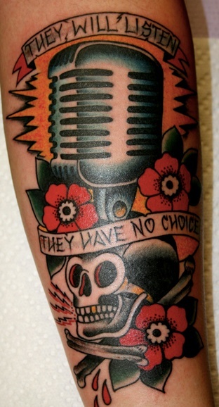 Traditional Flowers And Microphone Tattoo