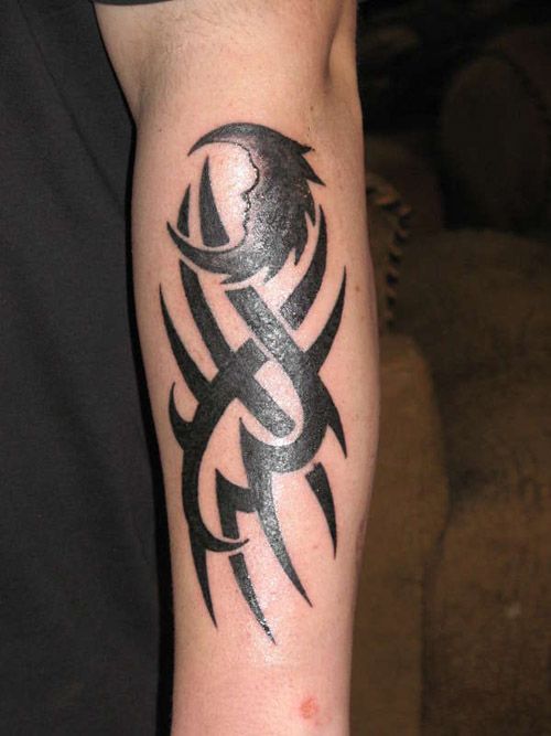 Tribal Design With Half Moon Tattoo On Forearm