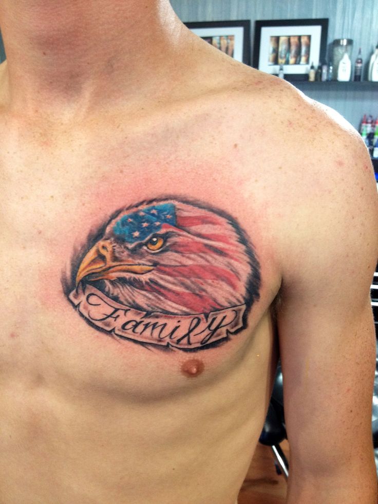 USA Flag Eagle Head With Banner Tattoo On Man Chest