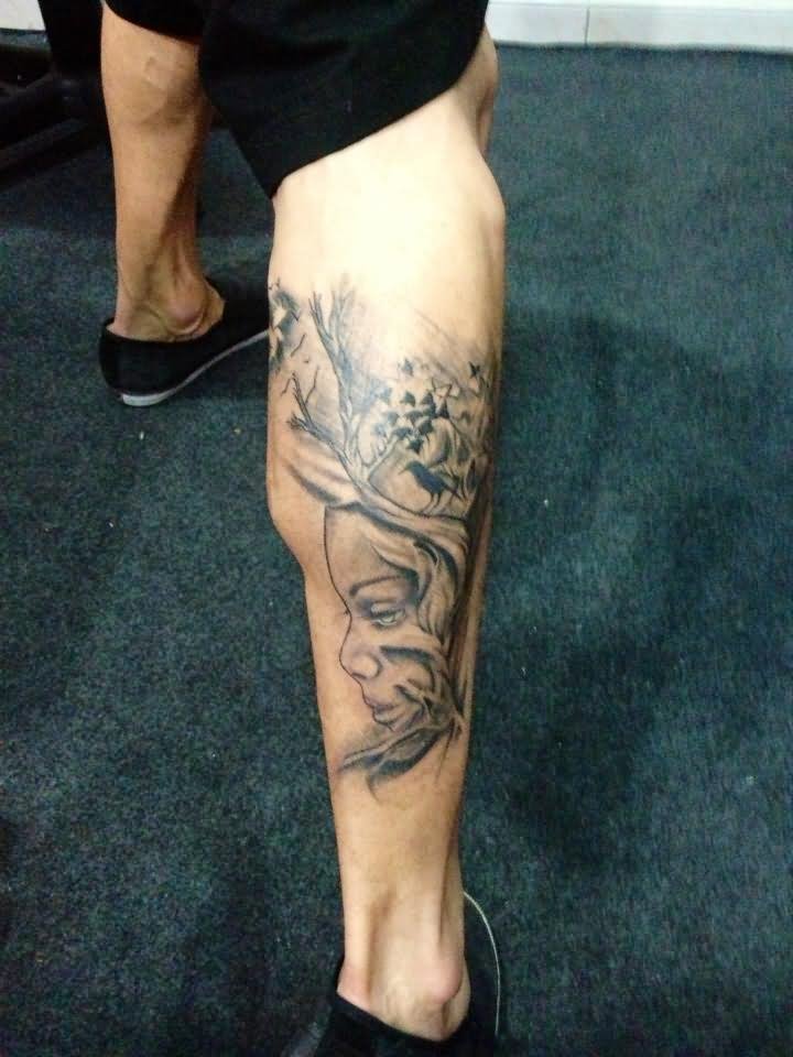 Unique Grey Ink Girl Face With Tree Tattoo On Leg Calf