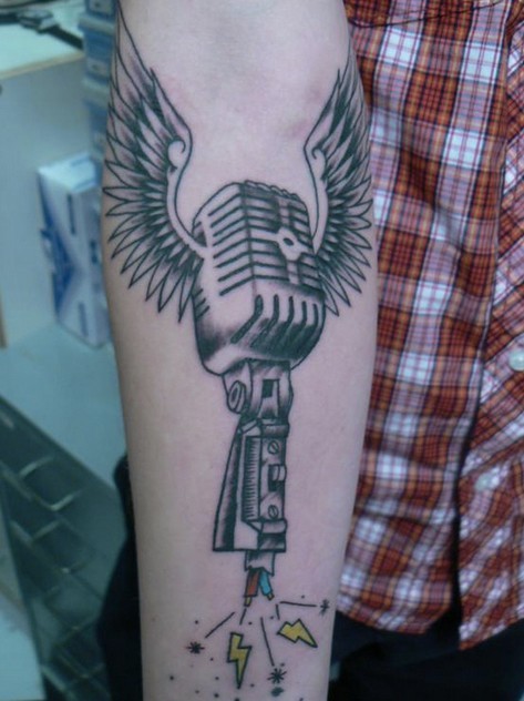 Winged Mic Tattoo On Forearm