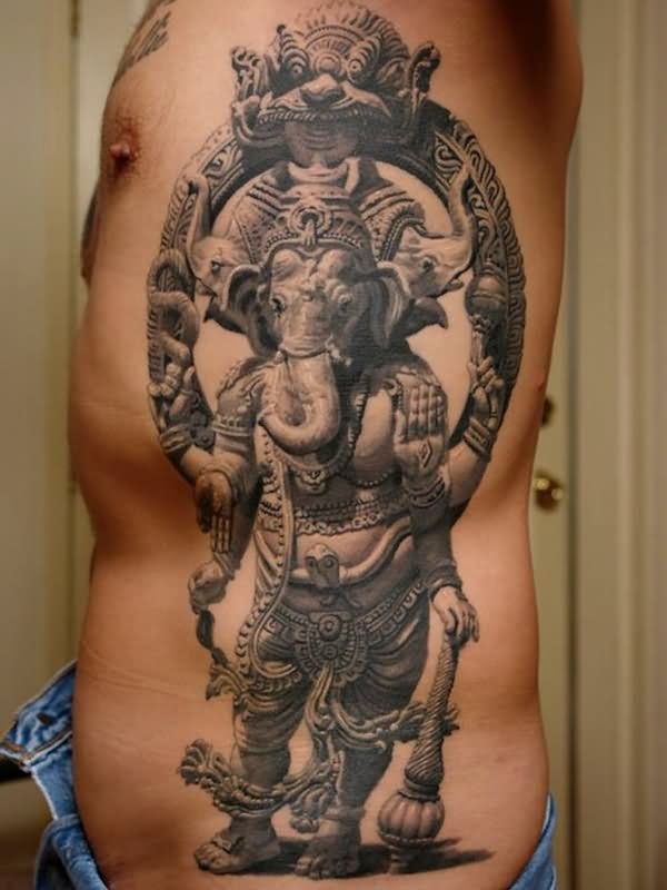 3D Indian Lord Ganesha Tattoo On Man Side Rib By Sergio Sanchez