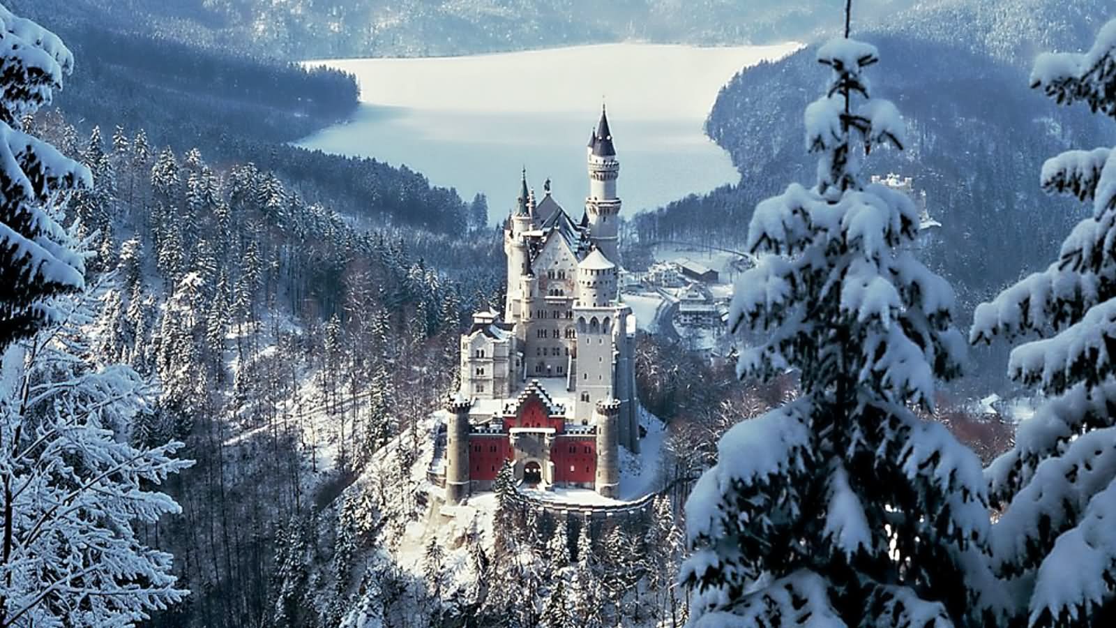 Aerial View Of The Neuschwanstein Castle Covered With Snow During Winter