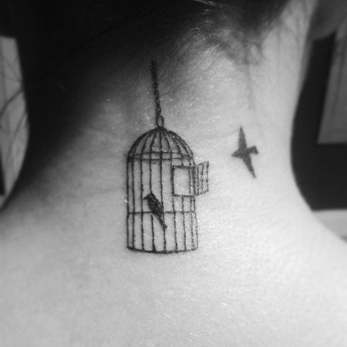Amazing Cage Tattoo On Girl Nape
