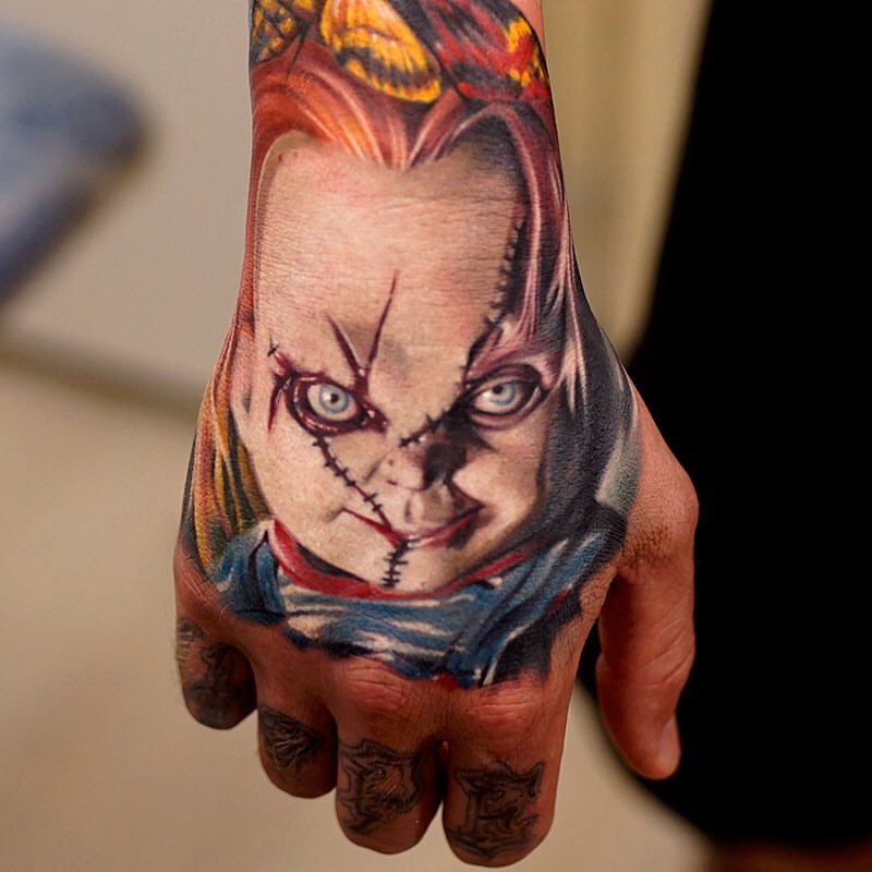 Amazing Chucky Tattoo On Right Hand