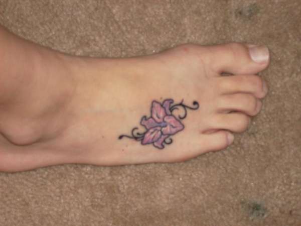 Amazing Flower Tattoo On Right Foot