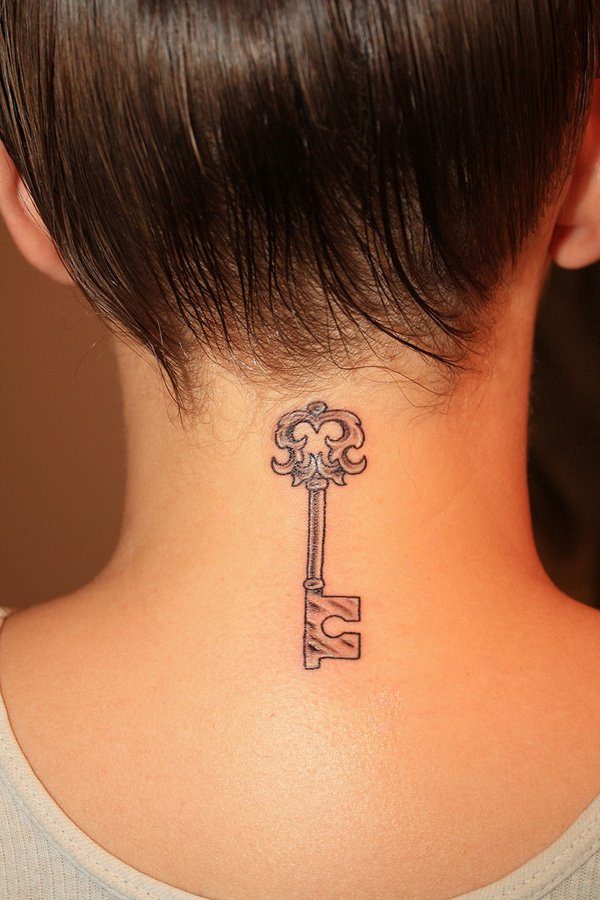 Amazing Key Tattoo On Back Neck