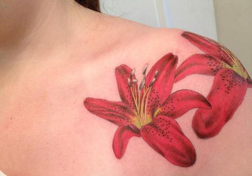 Amazing Lily Flowers Tattoo On Collar Bone