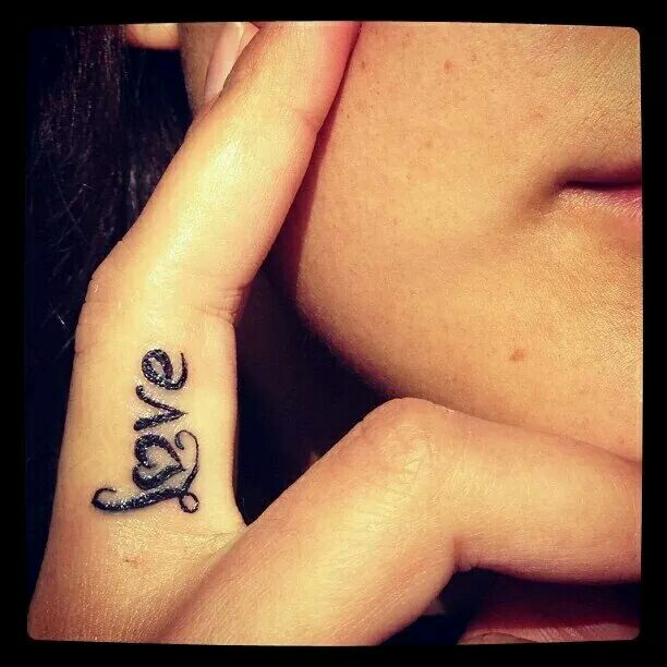 Amazing Love Lettering Tattoo On Girl Finger
