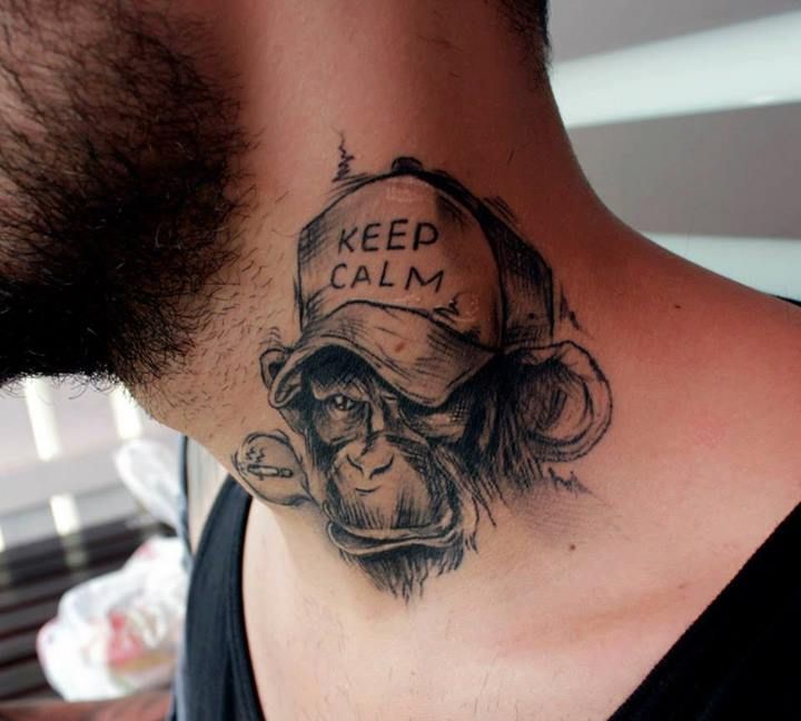 Amazing Monkey Face Tattoo On Man Side Neck