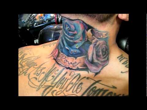Amazing Roses With Banner Tattoo On Man Neck