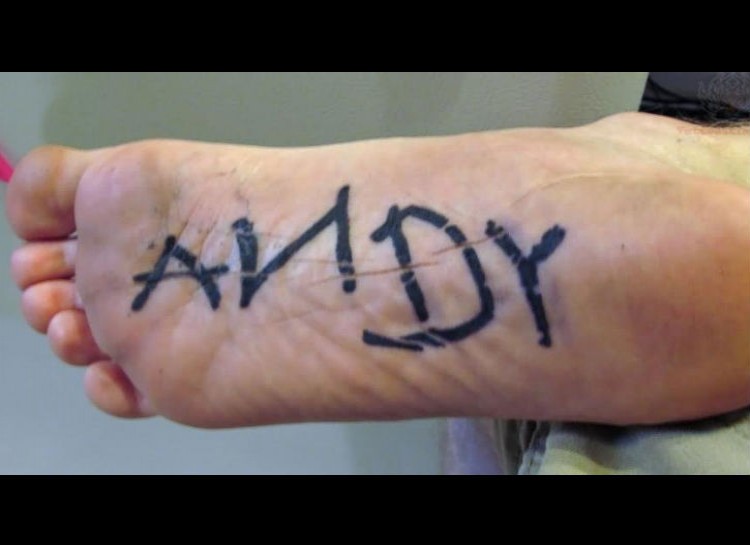 Andy Lettering Tattoo On Under Foot