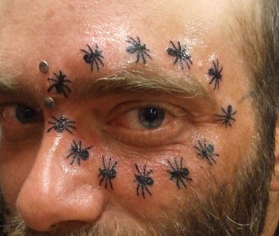 Ant Tattoos On Circle Around Eye