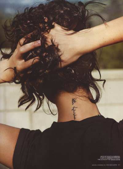 Arabic Words Tattoo On Back Neck
