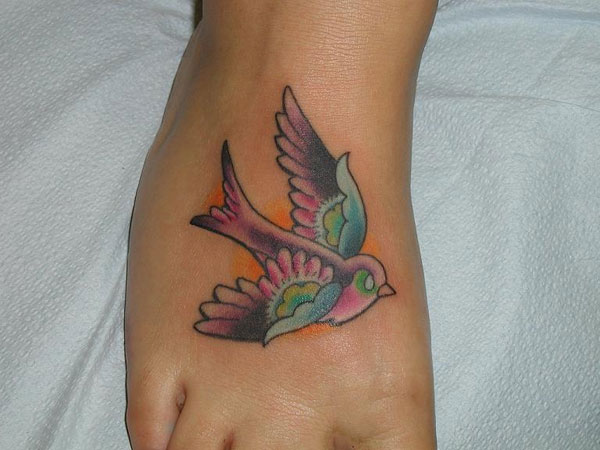 Attractive Colorful Bird Tattoo On Right Foot