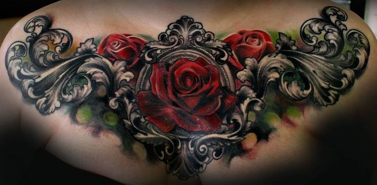 Attractive Gothic Roses Tattoo On Collarbone