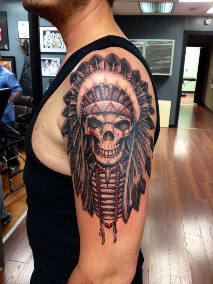 Attractive Indian Chief Skull Tattoo On Man Left Half Sleeve